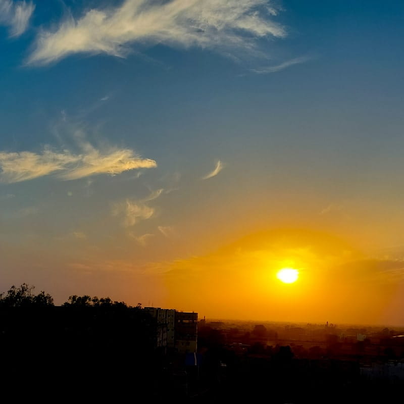 Sunrise across the field on a spring morning